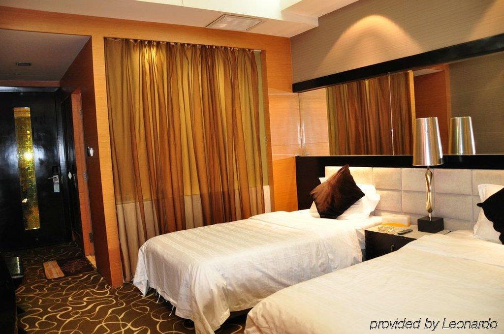 Harbin Yakelai Holiday Hotel Habitación foto