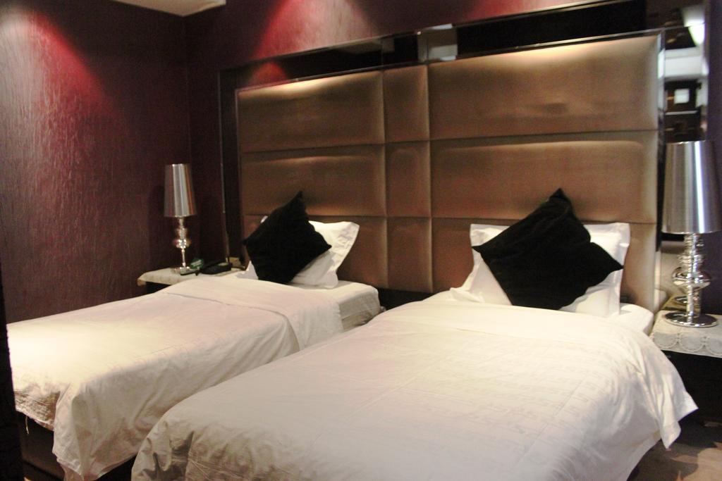 Harbin Yakelai Holiday Hotel Habitación foto